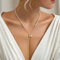 Long butterfly pearl necklace